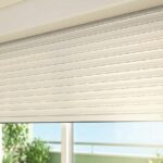 ¿Tus ventanas parecen neveras? Descubre cómo las persianas de aluminio térmico actúan como un abrigo para tu hogar y frenan la humedad de Barcelona.